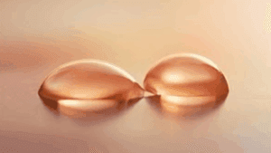 Two water drops merging